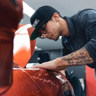 CCS technician detailing a freshly repaired panel