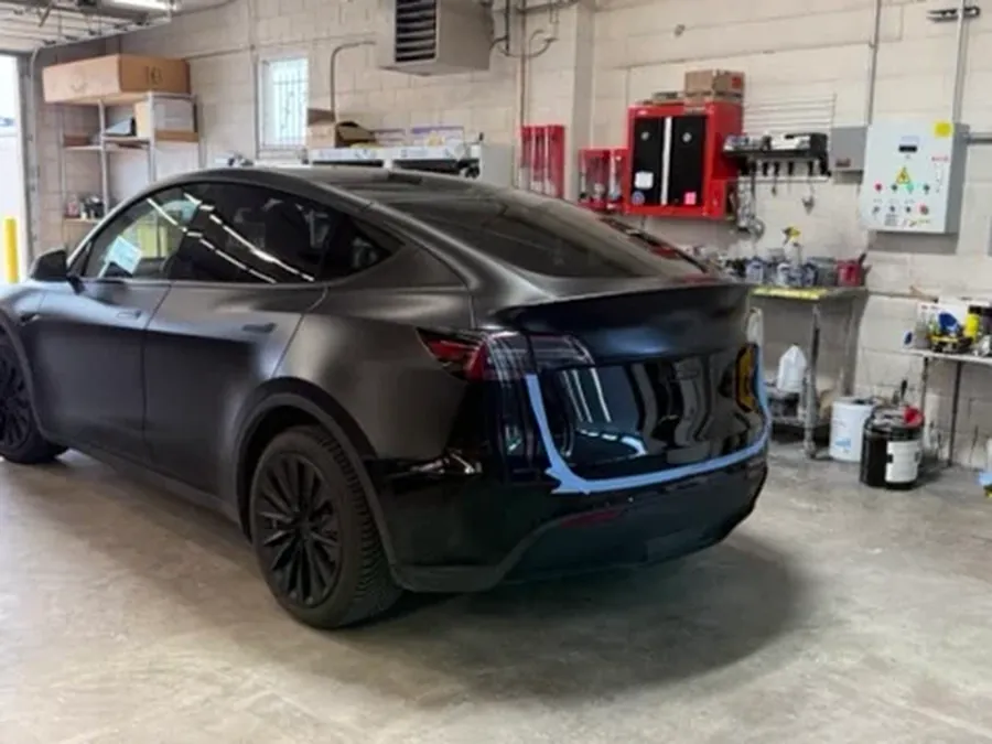 Satin black Tesla Model Y in the CCS shop