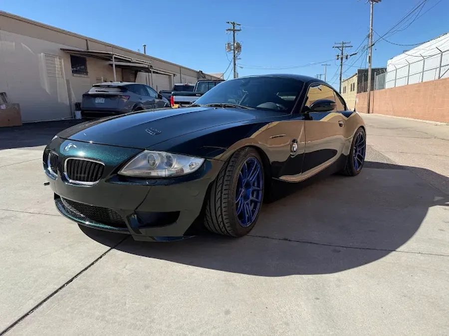 Repaired BMW Z4 M Coupe — deep green, flawless finish